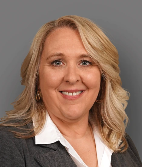 Professional photo of Jennifer Penn on a gray background