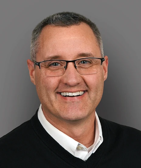 Professional photo of Anthony Brandy on a gray background